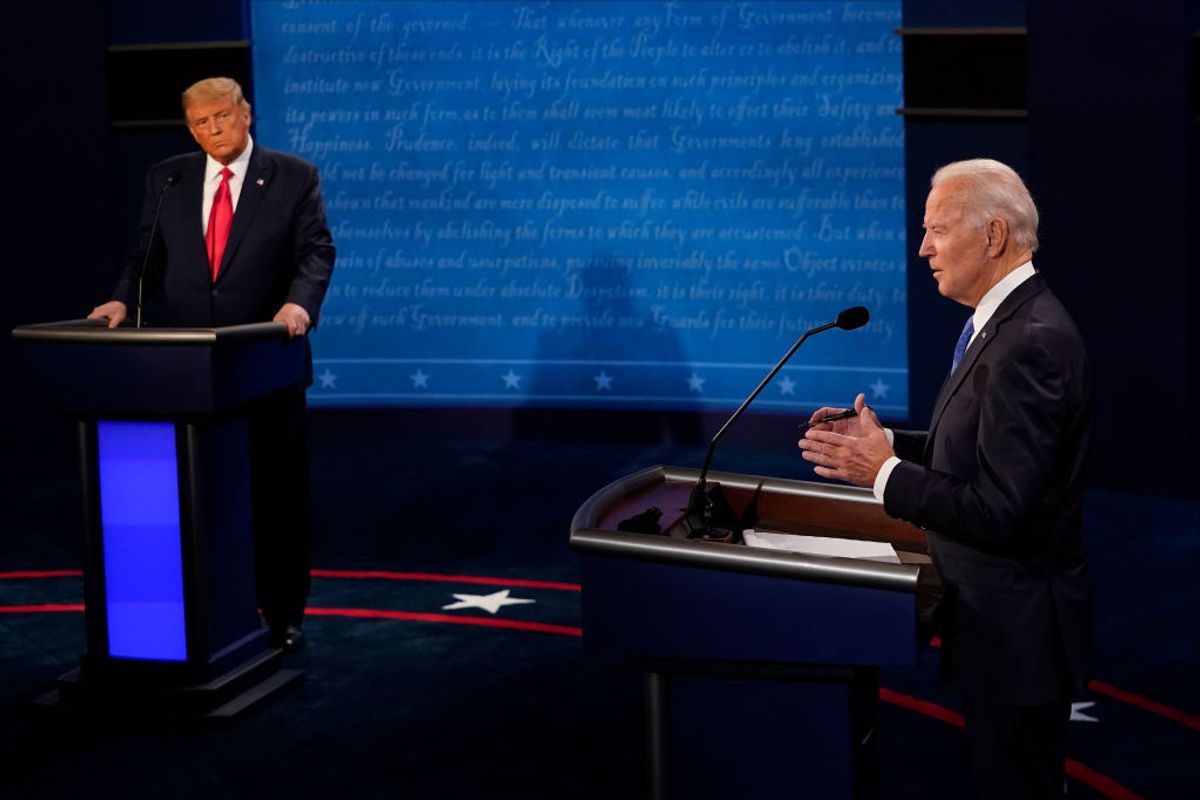 US President Donald Trump and Democratic Presidential candidate and former US Vice President Joe Biden argue during the final presidential debate at Belmont University in Nashville, Tennessee, on October 22, 2020. (Photo by Morry GASH / POOL / AFP) (Photo by MORRY GASH/POOL/AFP via Getty Images) (Photo by MORRY GASH/POOL/AFP via Getty Images)