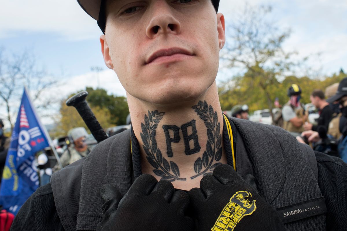PORTLAND,  OREGON - SEPTEMBER 26: Members of the Proud Boys, a far right organization dedicated to fighting with leftists, hold a rally on September 26, 2020 in Delta Park, on the northern edge of Portland, Oregon. Though they had pledged to "liberate" Portland from anarchists, they stayed on the edge the city and the rally remained peaceful.(Photo by Andrew Lichtenstein/Corbis via Getty Images) (Getty Images)
