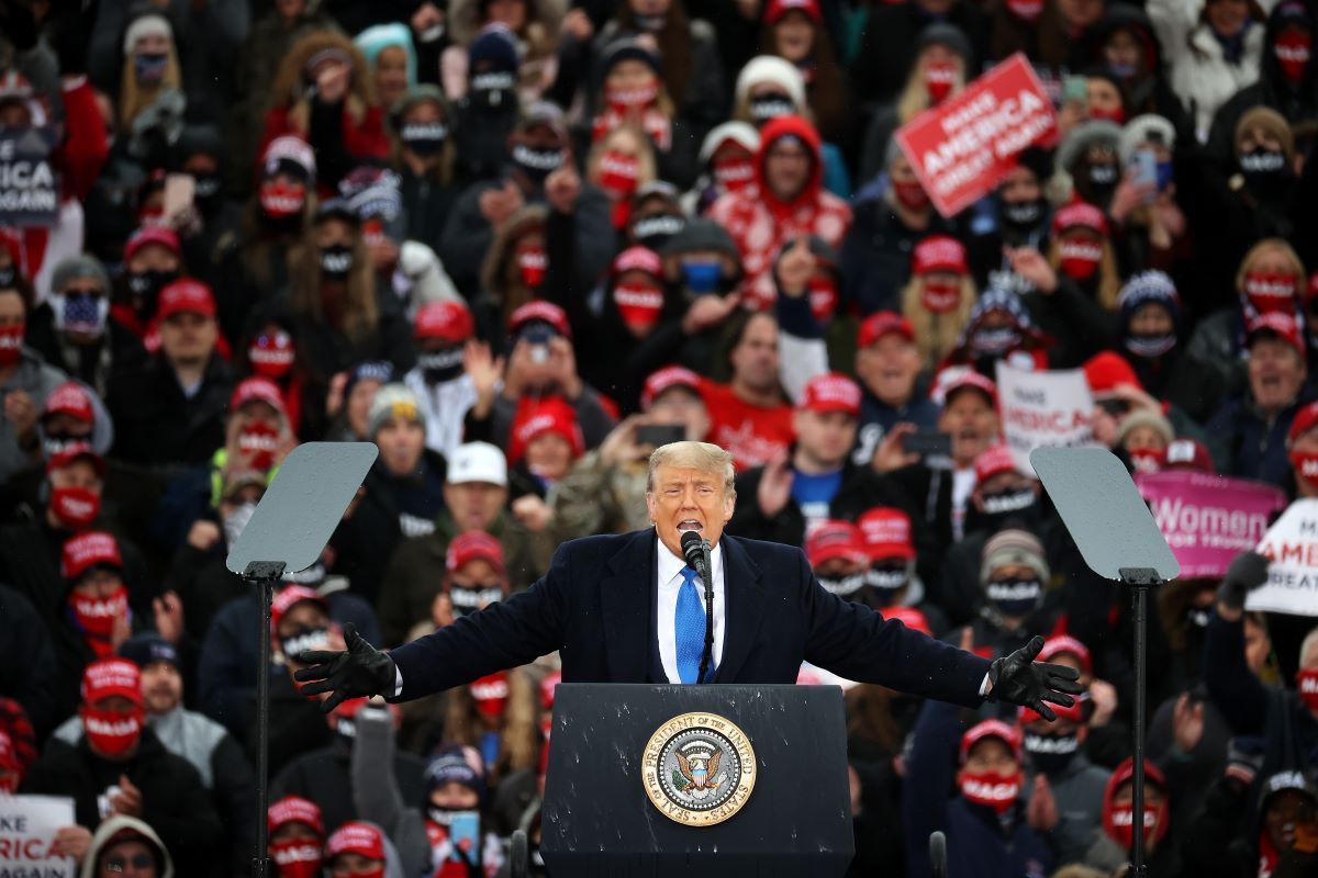 LANSING, MICHIGAN - OCTOBER 27: U.S. President Donald Trump addresses supporters during a campaign rally at Capital Region International Airport October 27, 2020 in Lansing, Michigan. With one week until Election Day, Trump is campaigning in Michigan, a state he won in 2016 by less than 11,000 votes, the narrowest margin of victory in the state's presidential election history. (Photo by Chip Somodevilla/Getty Images) (Chip Somodevilla/Getty Images)