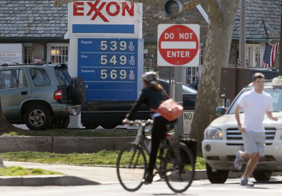 WASHINGTON, DC - MARCH 13: A sign shows gas prices over five dollars a gallon for all three grades at a EXXON service station on March 13, 2012 in Washington, DC According to AAA the average price of gas has climbed three tenths of a cent nationwide as a result of high oil prices and tensions tied to Iran's nuclear program.  (Photo by Mark Wilson/Getty Images) (Mark Wilson/Getty Images)