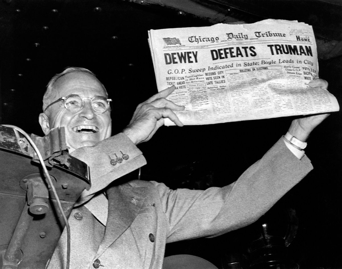 President Harry Truman holds up a copy of the Chicago Daily Tribune declaring his defeat to Thomas Dewey in the presidential election, St Louis, MIssouri, November 1948. (Photo by Underwood Archives/Getty Images) (Underwood Archives / Getty Images)