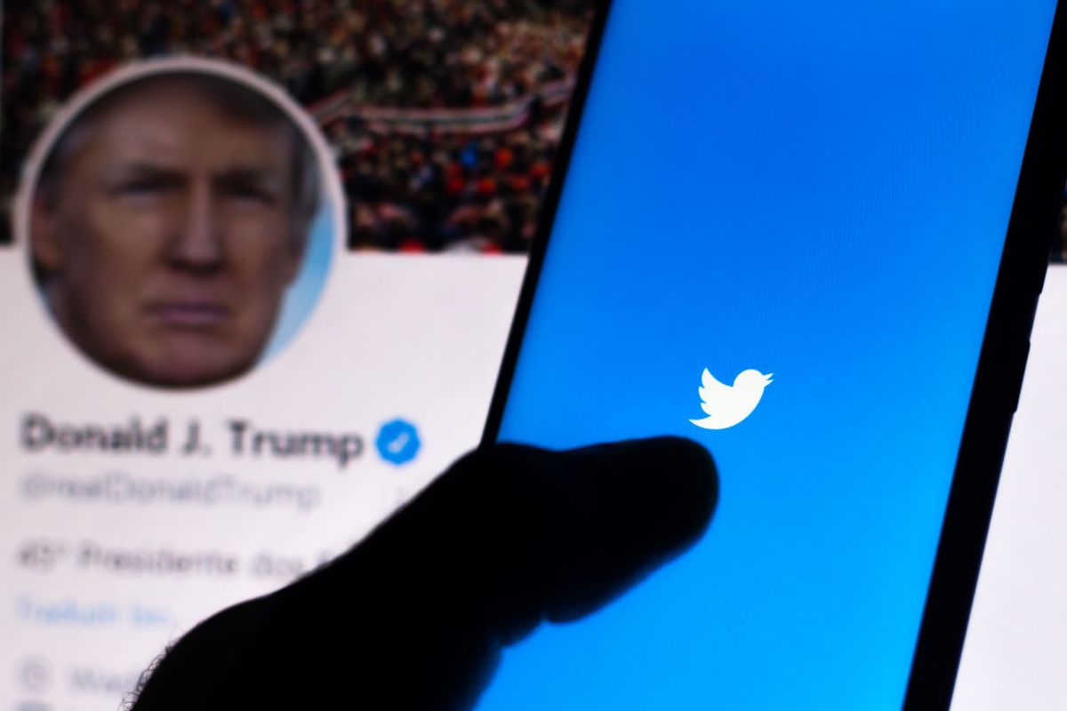 BRAZIL - 2020/06/05: In this photo illustration the Twitter logo seen displayed on a smartphone with the official page of the President of the United States, Donald Trump. 
Platform may suspend account of the American politician. (Photo Illustration by Rafael Henrique/SOPA Images/LightRocket via Getty Images) (Rafael Henrique/SOPA Images/LightRocket via Getty Images)