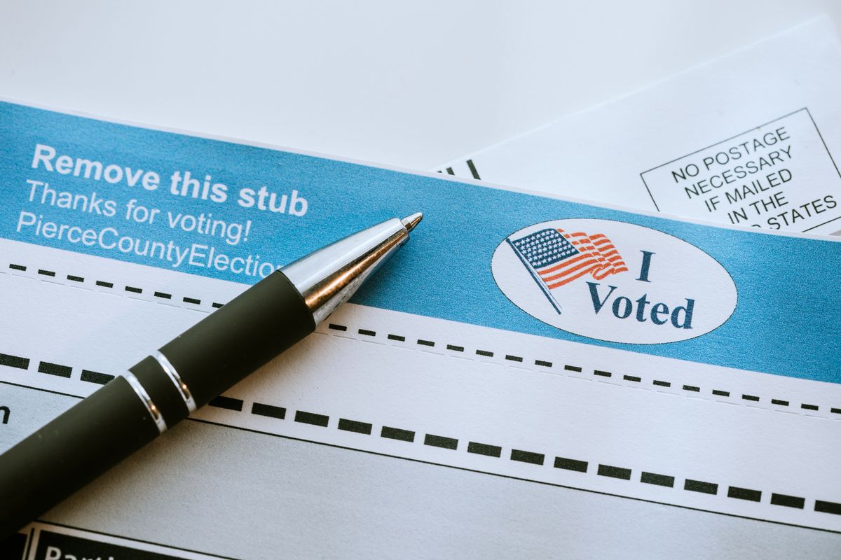 A close up image of a voters ballot to be mailed in, a pen ready to fill in the selected votes. (Getty Images)