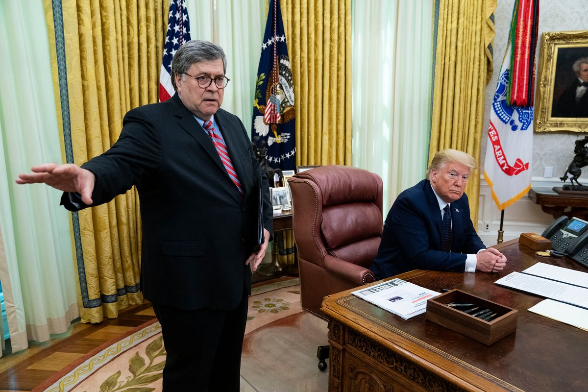 WASHINGTON, DC - MAY 28: U.S. President Donald Trump, with Attorney General William Barr, speaks in the Oval Office before signing an executive order related to regulating social media on May 28, 2020 in Washington, DC. Trump's executive order could lead to attempts to punish companies such as Twitter and Google for attempting to point out factual inconsistencies in social media posts by politicians. (Photo by Doug MIlls-Pool/Getty Images) (Doug Mills-Pool/Getty Images)