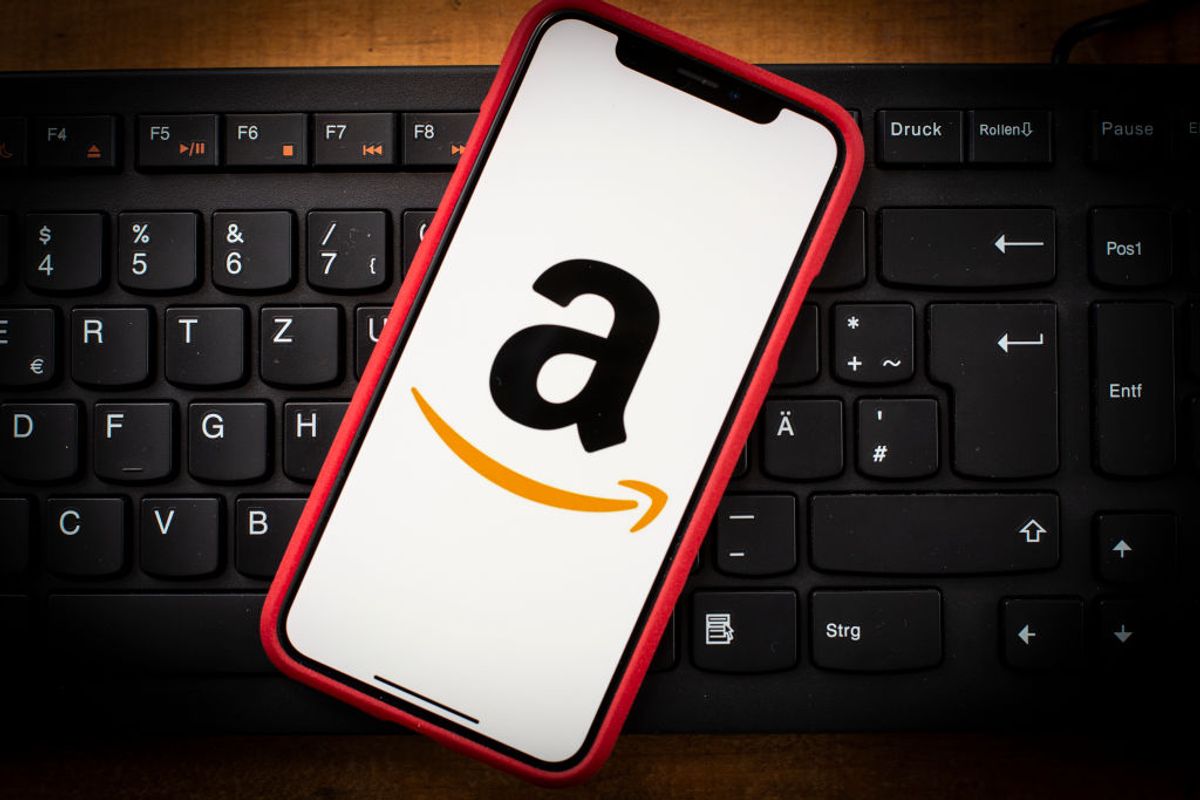 The Amazon logo is seen on a mobile phone in this photo illustration on January 29, 2019. Amazon is one of the top 10 most admired companies in the world according to Fortune magazine. (Photo by Jaap Arriens/NurPhoto via Getty Images) (Jaap Arriens/NurPhoto via Getty Images)