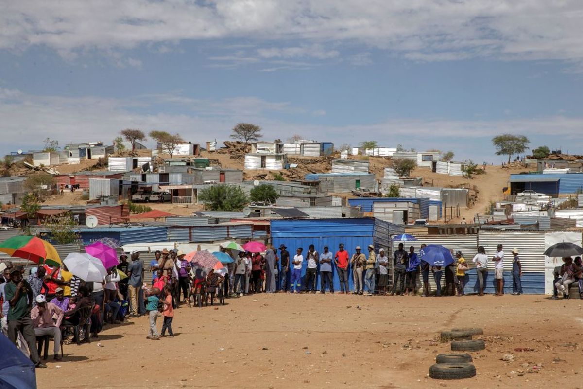 Namibians wait in line to access a polling station during the Namibian Presidential and parliamentary elections on November 27, 2019 in Windhoek, Namibia. (Photo by GIANLUIGI GUERCIA / AFP) (Photo by GIANLUIGI GUERCIA/AFP via Getty Images) (Gianluigi Guercia /Getty Images.)