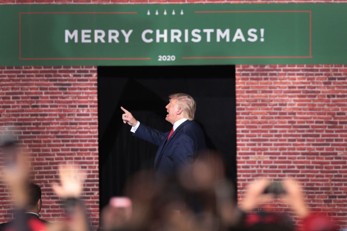 BATTLE CREEK, MICHIGAN - DECEMBER 18: President Donald Trump leaves his Merry Christmas Rally at the Kellogg Arena on December 18, 2019 in Battle Creek, Michigan. While Trump spoke at the rally the House of Representatives voted, mostly along party lines, to impeach the president for abuse of power and obstruction of Congress, making him just the third president in U.S. history to be impeached.  (Photo by Scott Olson/Getty Images) (Scott Olson/Staff)