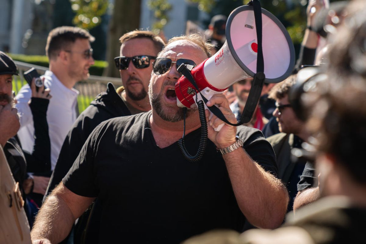 ATLANTA, GA - NOVEMBER 18: Alex Jones, host of Infowars, an extreme right-wing program that often trafficks in conspiracy theories, arrives at a "Stop the Steal" rally against the results of the U.S. Presidential election outside the Georgia State Capitol on November 18, 2020 in Atlanta, Georgia. (Photo by Elijah Nouvelage/Getty Images) (Elijah Nouvelage / Stringer, Getty Images)