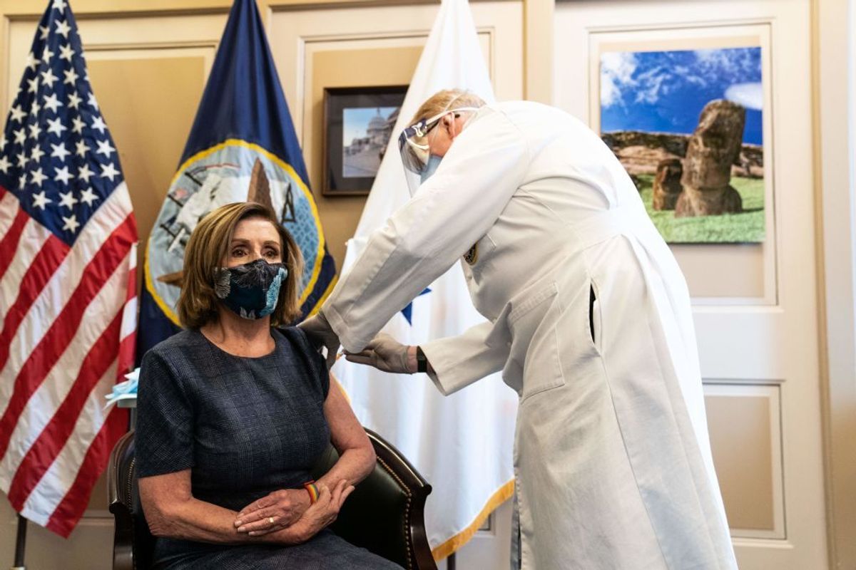 House Speaker Nancy Pelosi (D-CA) receives a Covid-19 vaccination shot by doctor Brian Monahan, attending physician Congress of the United States in her office on Capitol Hill in Washington, DC on December 18, 2020. (Photo by Anna Moneymaker / POOL / AFP) (Photo by ANNA MONEYMAKER/POOL/AFP via Getty Images) (Anna Moneymaker/Contributor)