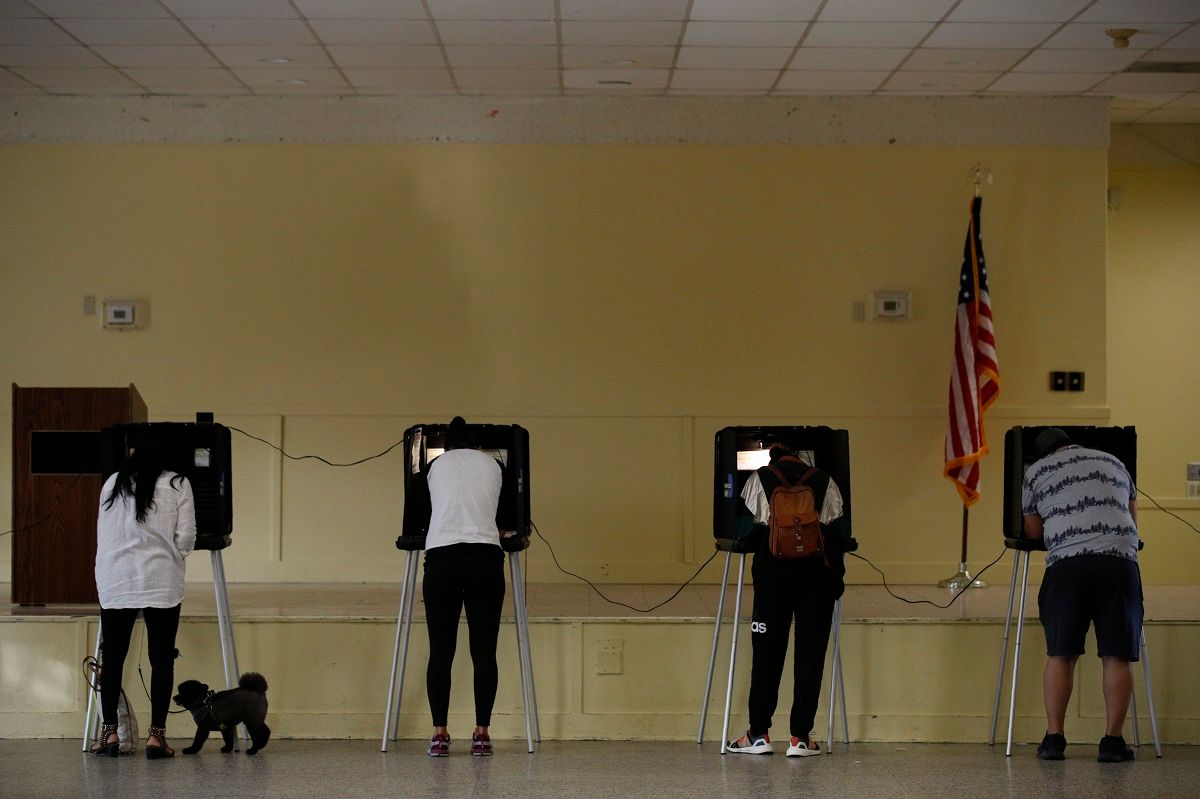 Voters fill out their ballots at the Legion Park polling station in Miami, on Election Day, Tuesday, Nov. 3, 2020.(AP Photo/Rebecca Blackwell) (AP Photo / Rebecca Blackwell)