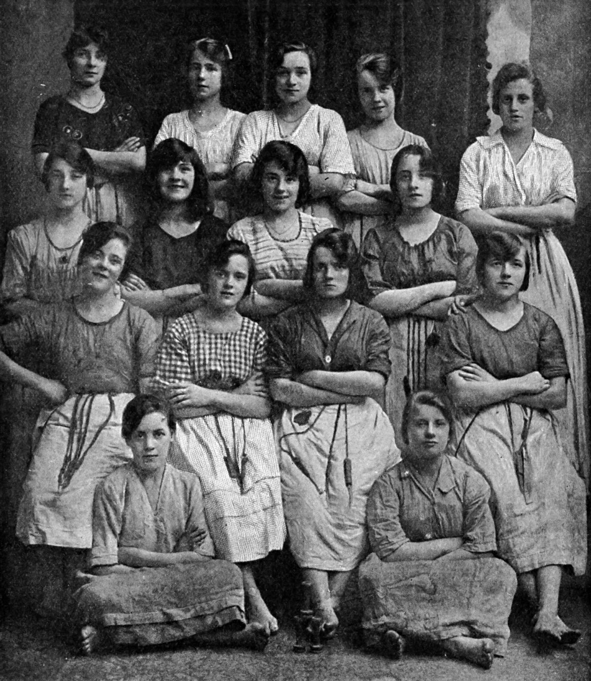 Historical Geography. 1900. Ireland. Here are some happy Ulster girls from a linen factory of North Ireland's chief city. Irish linen long ago made a name for itself, and many of the finest handkerchiefs and lingerie come from this source. The flax fibre is derived from the stalk of the plant. Each girl in the photograph has round her waist a cord sustaining various implements used in her work. (Photo by: SeM/Universal Images Group via Getty Images) (SeM/Universal Images Group via Getty Images)