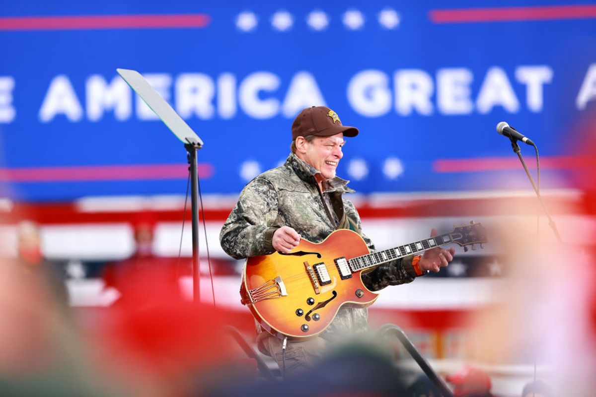 MUSKEGON, MI - OCTOBER 17: Ted Nugent performs at a campaign event for U.S. President Donald Trump on October 17, 2020 in Muskegon, Michigan. After testing positive and reportedly recovering from the coronavirus, President Trump has ramped up his schedule of public events as he continues to campaign against Democratic presidential nominee Joe Biden ahead of the November election.  (Photo by Rey Del Rio/Getty Images)