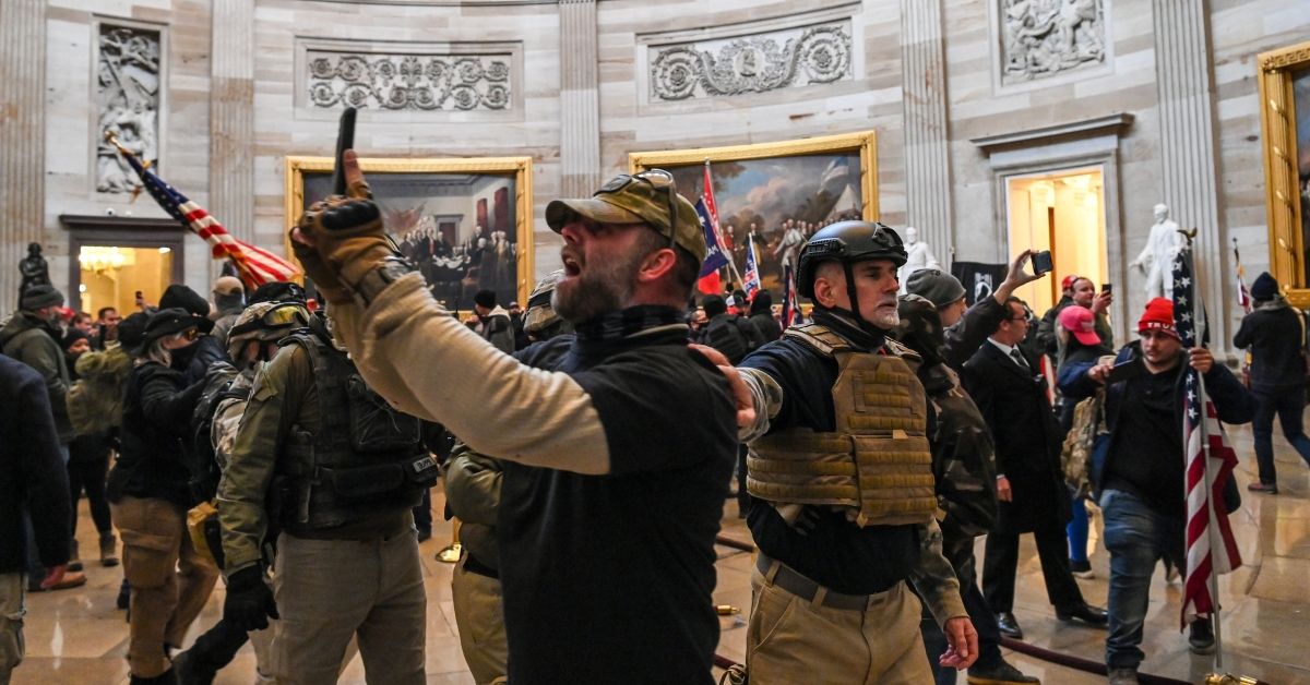 TOPSHOT - Supporters of US President Donald Trump enter the US Capitol's Rotunda on January 6, 2021, in Washington, DC. - Demonstrators breeched security and entered the Capitol as Congress debated the a 2020 presidential election Electoral Vote Certification. (Photo by Saul LOEB / AFP) (Photo by SAUL LOEB/AFP via Getty Images) (SAUL LOEB/AFP via Getty Images)