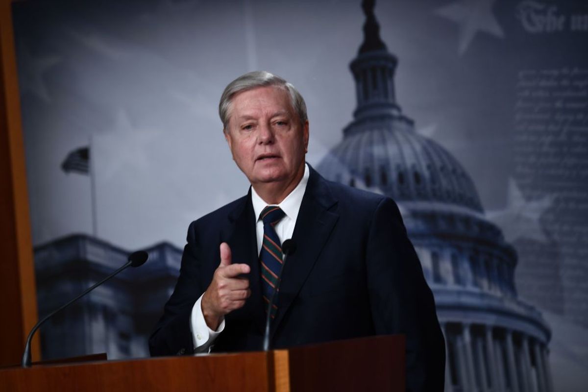 US Senator Lindsey Graham (R-SC) speaks during a news conference at the US Capitol on January 7, 2021 in Washington,DC. - For years, party leaders like senators Mitch McConnell and Lindsey Graham had performed contortions to avoid confronting the populist president.
No longer."Enough's enough," Graham pronounced in Congress after lawmakers reconvened into the early hours of January 7, 2021 to complete Biden's certification. Around them lay the debris of Trump's darkest day -- trashed offices, broken windows and bullet holes from shootings that left one woman dead."It's over," Graham said. (Photo by Brendan Smialowski / AFP) (Photo by BRENDAN SMIALOWSKI/AFP via Getty Images) (BRENDAN SMIALOWSKI/AFP via Getty Images)