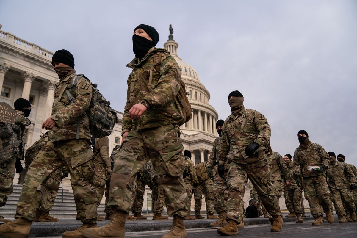 WASHINGTON, DC - JANUARY 11: National Guard member stage on the U.S. Capitol Building grounds, as heightened security measures are in place nearly a week after a pro-Trump insurrectionist mob breached the security of the nations capitol while Congress voted to certify the 2020 Election Results on Monday, Jan. 11, 2021 in Washington, DC. (Kent Nishimura / Los Angeles Times via Getty Images) (Getty Images)