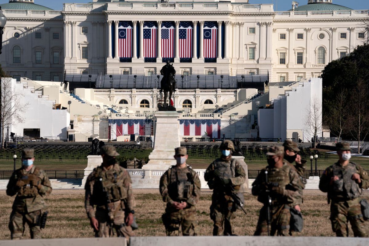 WASHINGTON, DC - JANUARY 14: Members of the National Guard stand outside the U.S. Capitol on January 14, 2021 in Washington, DC. Security has been increased throughout Washington following the breach of the U.S. Capitol last Wednesday, and leading up to the Presidential Inauguration. (Photo by Stefani Reynolds/Getty Images) (Stefani Reynolds/Getty Images)