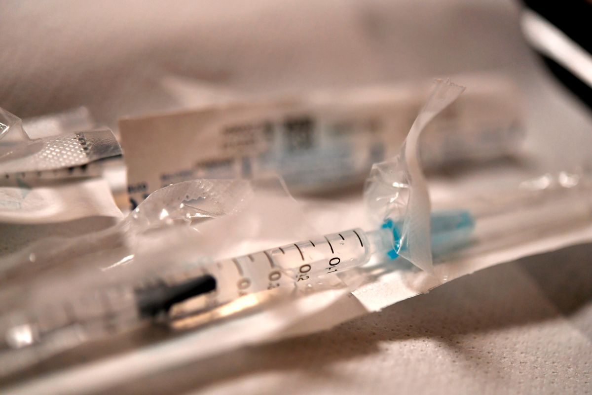 A syringe filled with a Covid-19 vaccine is ready to be delivered to an elderly person on January 20, 2021, at a vaccination center in Quimper, western France. (Photo by Fred TANNEAU / AFP) (Photo by FRED TANNEAU/AFP via Getty Images) (FRED TANNEAU / Contributor / Getty Images)