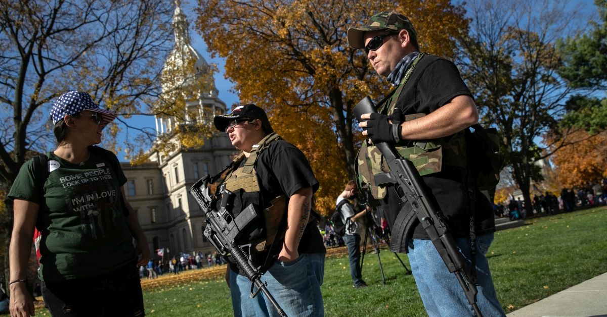 LANSING, MICHIGAN - NOVEMBER 07: Armed Trump supporters take part in a demonstration at the Michigan State Capitol building on November 07, 2020 in Lansing, Michigan. The pro-Trump rally was disrupted when counter-protesters rushed into the event. (Photo by John Moore/Getty Images) (John Moore/Getty Images)
