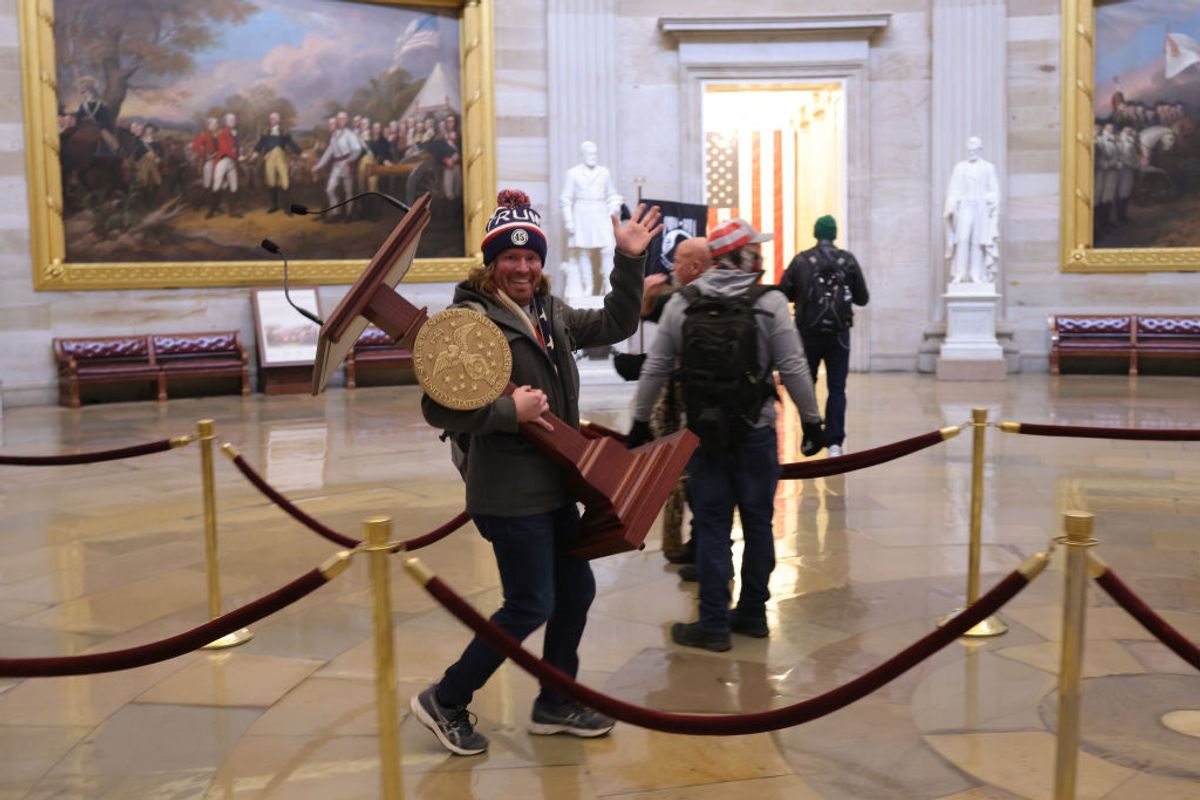 WASHINGTON, DC - JANUARY 06: Protesters enter the U.S. Capitol Building on January 06, 2021 in Washington, DC. Congress held a joint session today to ratify President-elect Joe Biden's 306-232 Electoral College win over President Donald Trump. A group of Republican senators said they would reject the Electoral College votes of several states unless Congress appointed a commission to audit the election results. (Photo by Win McNamee/Getty Images) (Getty Images)