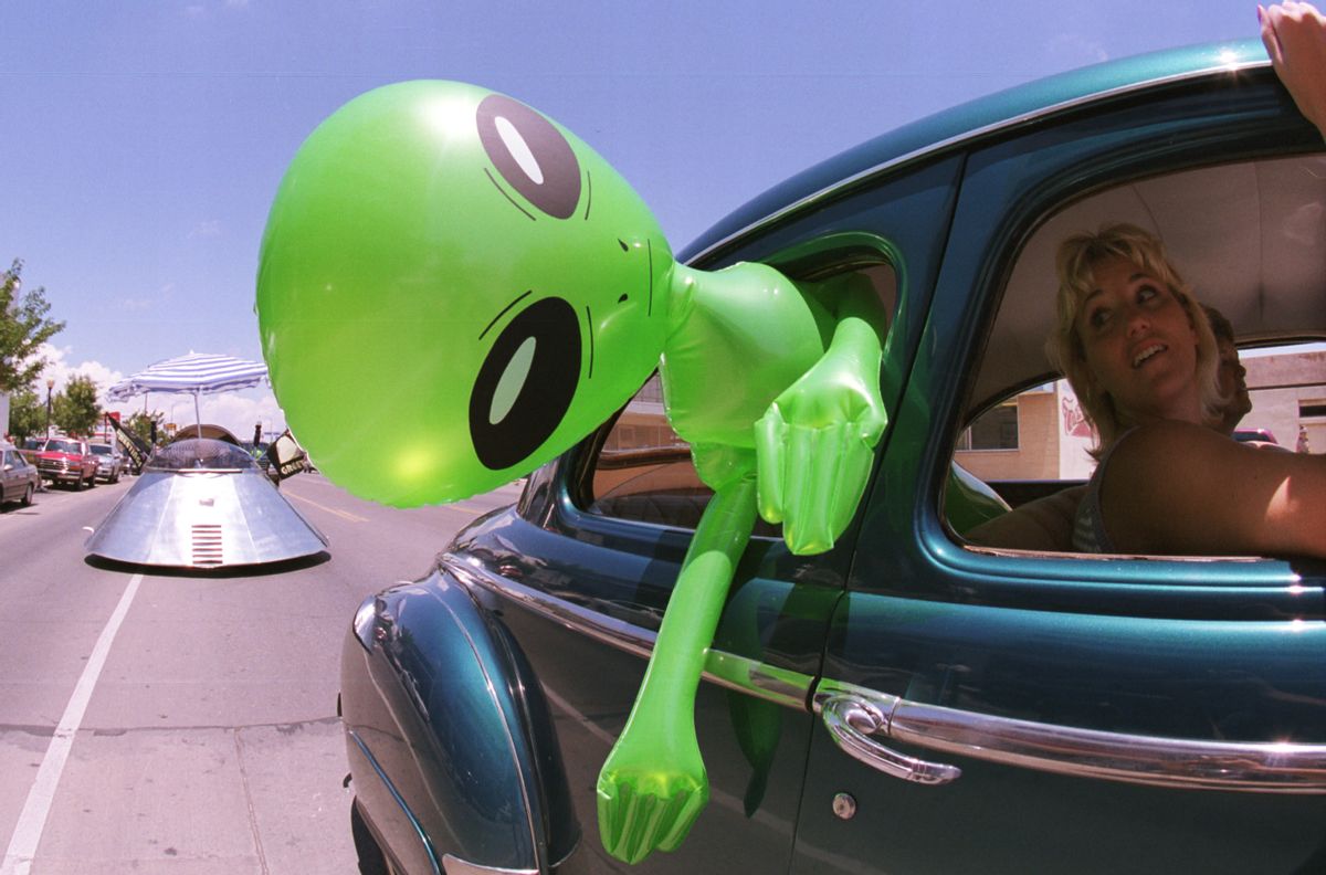 372049 02: An alien doll hangs out a car window in downtown Roswell, New Mexico July 1, 2000 as part of the annual UFO Encounter, which runs through July 4, 2000. The annual festival stems from a mysterious crash northwest of Roswell in 1947. The Army initially said it was a UFO crash, but quickly backed off that report. The Pentagon has since said it was a top-secret balloon crash, but UFO enthusiasts don''t believe that story, which gives rise to what has become known as the "Roswell Incident". (Photo by Joe Raedle/Newsmakers) ( Joe Raedle / Getty Images)