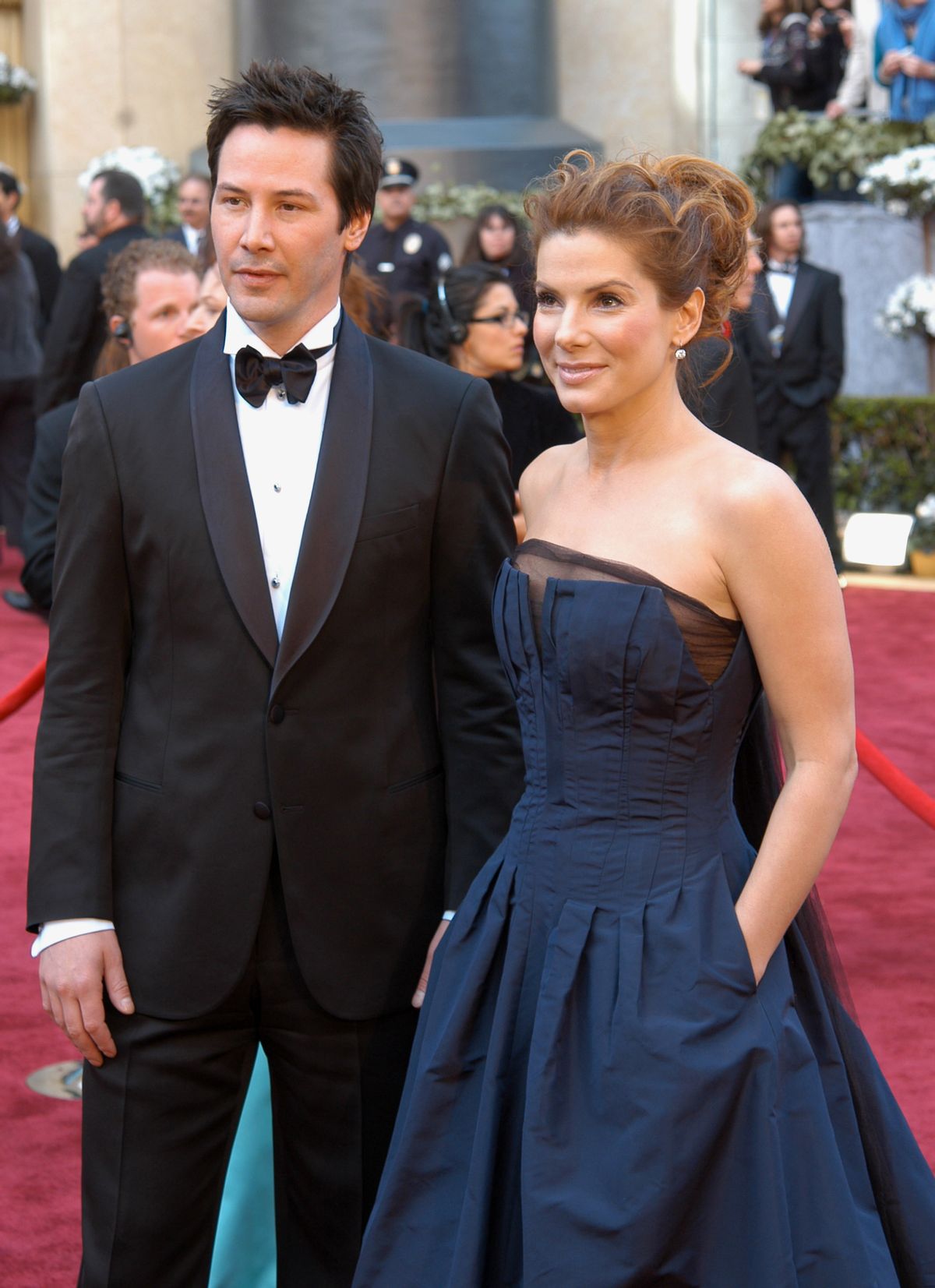 Keanu Reeves and Sandra Bullock during The 78th Annual Academy Awards - Arrivals at Kodak Theatre in Hollywood, California, United States. (Photo by Ron Galella, Ltd./Ron Galella Collection via Getty Images) (Ron Galella, Ltd./Ron Galella Collection via Getty Images)