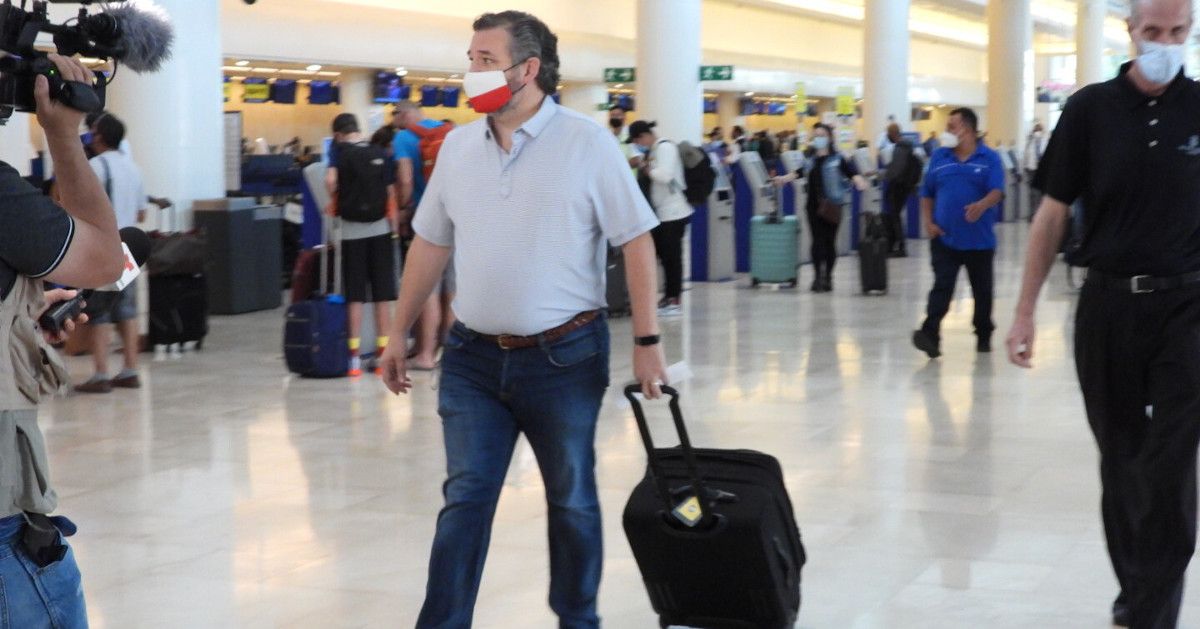 CANCUN, MEXICO - FEBRUARY 18: Sen. Ted Cruz (R-TX) checks in for a flight at Cancun International Airport after a backlash over his Mexican family vacation as his home state of Texas endured a Winter storm on February 18, 2021 in Cancun, Quintana Roo, Mexico. The Republican politician came under fire after leaving for the warm holiday destination as hundreds of thousands of people in the lone star state suffered a loss of power. Reports stated that Cruz was due to catch a flight back to Houston, Texas. (Photo by MEGA/GC Images) (MEGA/GC Images)