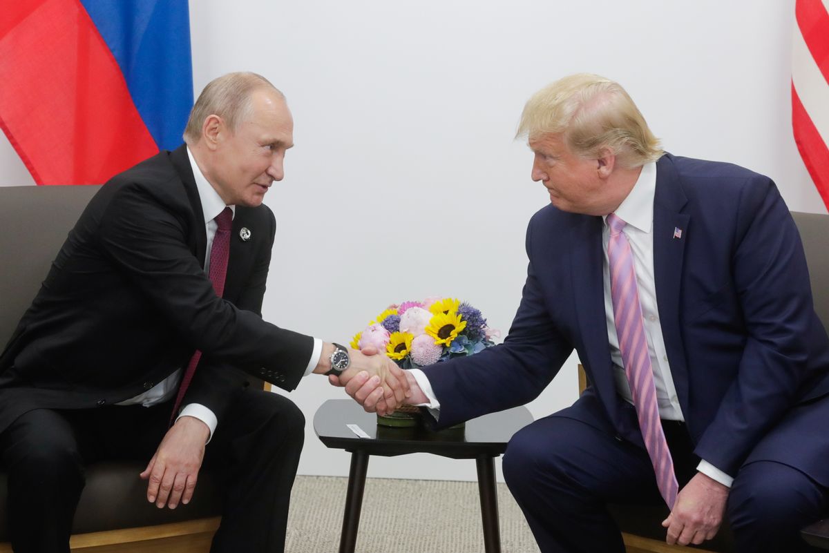 OSAKA, JAPAN - JUNE 28, 2019: Russia's President Vladimir Putin (L) and US President Donald Trump shake hands during a meeting on the sidelines of the 2019 G20 Summit at the INTEX Osaka International Exhibition Centre. Mikhail Metzel/TASS (Photo by Mikhail MetzelTASS via Getty Images) (Mikhail Metzel\TASS via Getty Images)