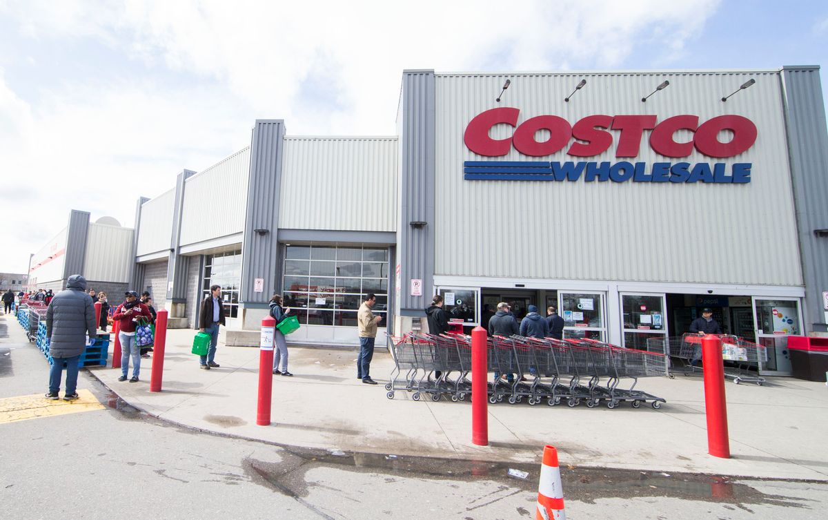 MISSISSAUGA ,CANADA, March 20, 2020 . Customers line up with a social distance to enter a Costco warehouse store in Mississauga, Ontario, Canada, on March 20, 2020. Canadian Prime Minister Justin Trudeau announced new measures Friday morning to mobilize manufacturers to quickly produce vital life-saving medical supplies against the COVID-19 pandemic in the country. As of Friday noon, Canada has confirmed 924 COVID-19 cases and 13 people died of the coronavirus. (Photo by Zou Zheng/Xinhua via Getty) (Xinhua/Zou Zheng via Getty Images) (Xinhua/Zou Zheng via Getty Images)