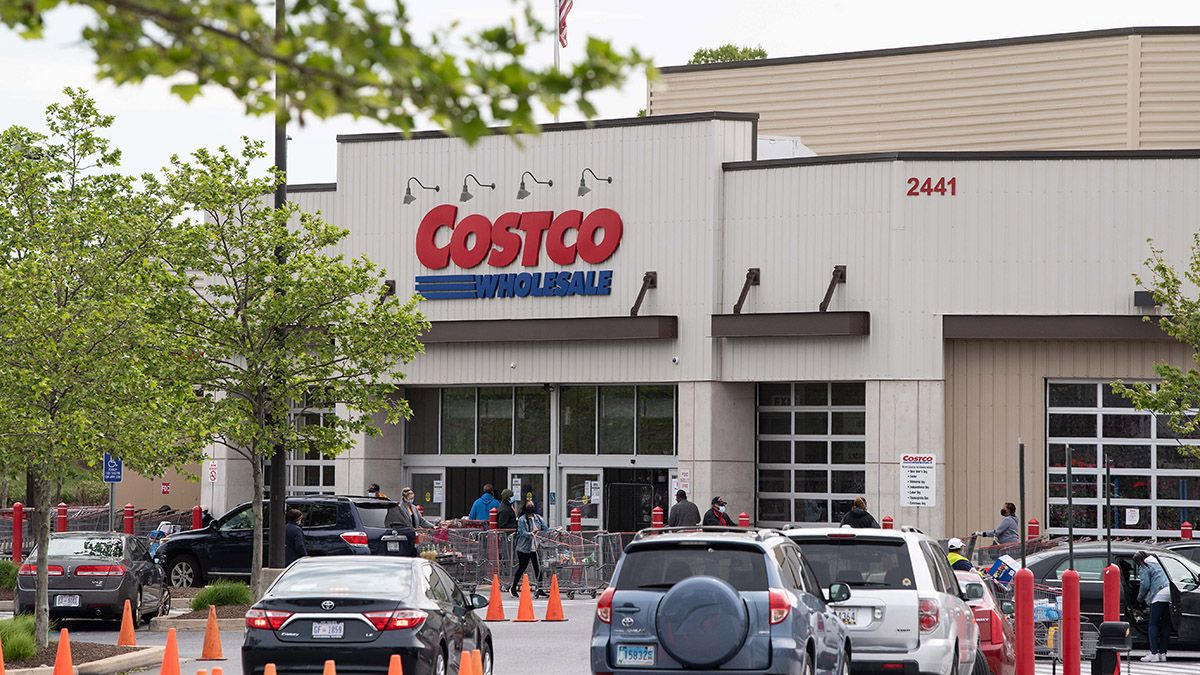 Shoppers walk out with full carts from a Costco store in Washington, DC, on May 5, 2020. - Big-box retailer Costco is limiting consumer purchases of meat in the wake of shutdowns of US processing plants due to the coronavirus.Costco, which has about 440 stores in the United States, is limiting purchases to three items among beef, pork and poultry products, the company said on its website. (Photo by Nicholas Kamm / AFP) (Photo by NICHOLAS KAMM/AFP via Getty Images) (Nicholas Kamm/AFP via Getty Images)