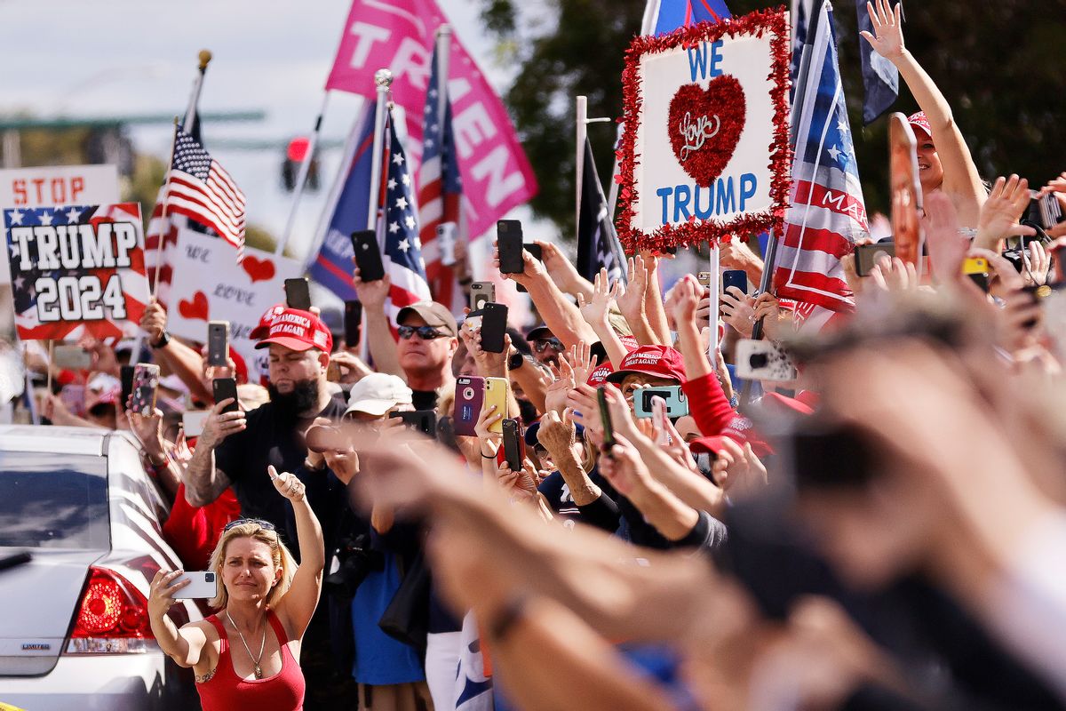 WEST PALM BEACH, FLORIDA - JANUARY 20: Supporters wave to outgoing US President Donald Trump as he returns to Florida along the route leading to his Mar-a-Lago estate on January 20, 2021 in West Palm Beach, Florida. Trump, the first president in more than 150 years to refuse to attend his successor's inauguration, is expected to spend the final minutes of his presidency at his Mar-a-Lago estate in Florida. (Photo by Michael Reaves/Getty Images) (Getty Images)