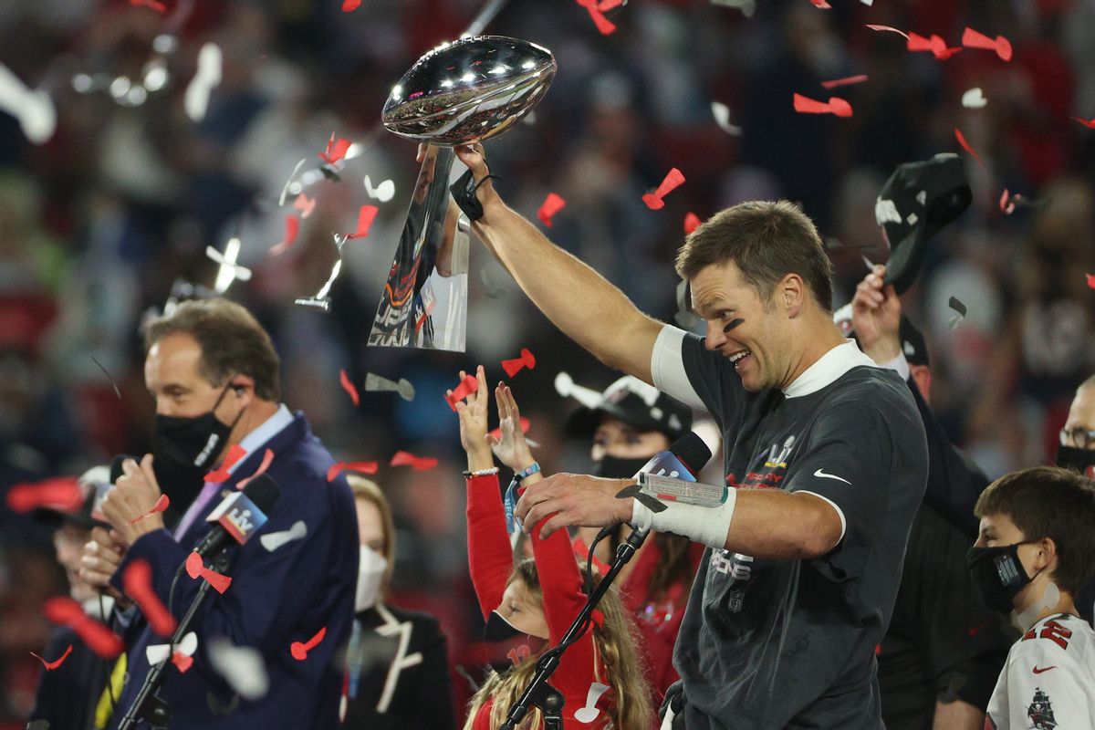 TAMPA, FLORIDA - FEBRUARY 07: Tom Brady #12 of the Tampa Bay Buccaneers hoists the Vince Lombardi Trophy after winning Super Bowl LV at Raymond James Stadium on February 07, 2021 in Tampa, Florida. The Buccaneers defeated the Chiefs 31-9. (Photo by Patrick Smith/Getty Images) (Patrick Smith/Getty Images)