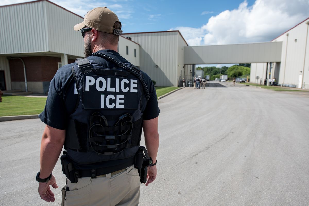 US Immigration and Customs Enforcement's (ICE) special agent preparing to arrest alleged immigration violators at Fresh Mark, Salem, June 19, 2018. Image courtesy ICE ICE / U.S. Immigration and Customs Enforcement. (Photo by Smith Collection/Gado/Getty Images) (Smith Collection/Gado/Getty Images)