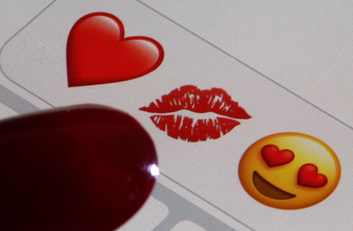PARIS, FRANCE - FEBRUARY 14: In this photo illustration, emoji or emoticon representing a heart, lips and heart-shaped eyes are displayed on the screen of an iPhone on Valentine's Day on February 14, 2020 in Paris, France. Valentine's Day is known as the Lovers' Day and the celebration of love and romance in many parts of the world. (Photo by Chesnot/Getty Images) (Chesnot/Getty Images)
