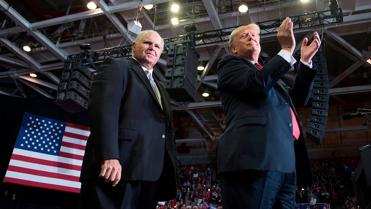 US President Donald Trump alongside radio talk show host Rush Limbaugh arrive at a Make America Great Again rally in Cape Girardeau, Missouri on November 5, 2018. (Photo by Jim WATSON / AFP) (Photo by JIM WATSON/AFP via Getty Images) (JIM WATSON / Contributor)