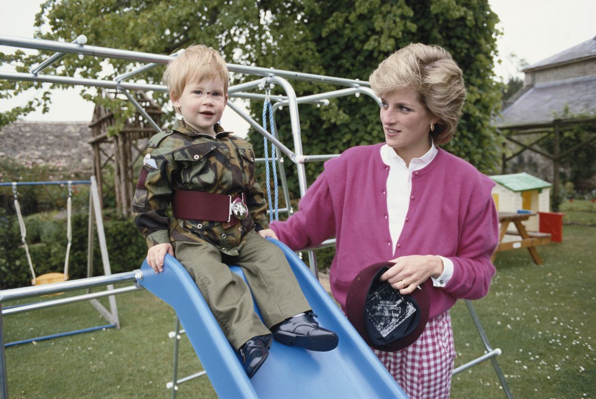 Prince Harry wearing the uniform of the Parachute Regiment of the British Army in the garden of Highgrove House in Gloucestershire, 18th July 1986. He is accompanied by his mother, Diana, Princess of Wales (1961 - 1997). (Photo by Tim Graham Photo Library via Getty Images) (Tim Graham/Contributor)