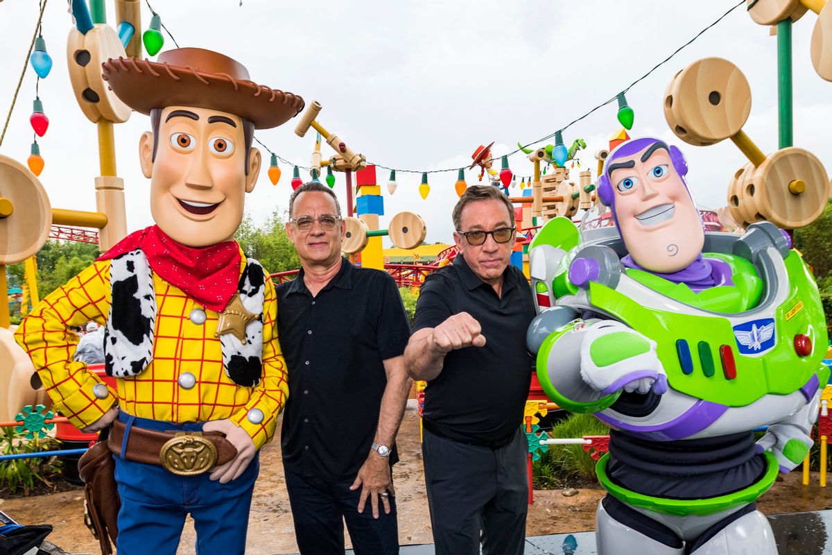 LAKE BUENA VISTA, FLORIDA - JUNE 08: In this Handout provided by Disney Resorts, Stars from DisneyPixars Toy Story 4 Woody (in costume), Tom Hanks (2nd-L), Tim Allen (2nd-R) and Buzz Lightyear (in costume) appear with characters from the film inside Toy Story Land at Disneys Hollywood Studios at Walt Disney World Resort on June 8, 2019 in Lake Buena Vista, Florida. (Photo by Matt Stroshane/Disney Resorts via Getty Images) (Getty Images)