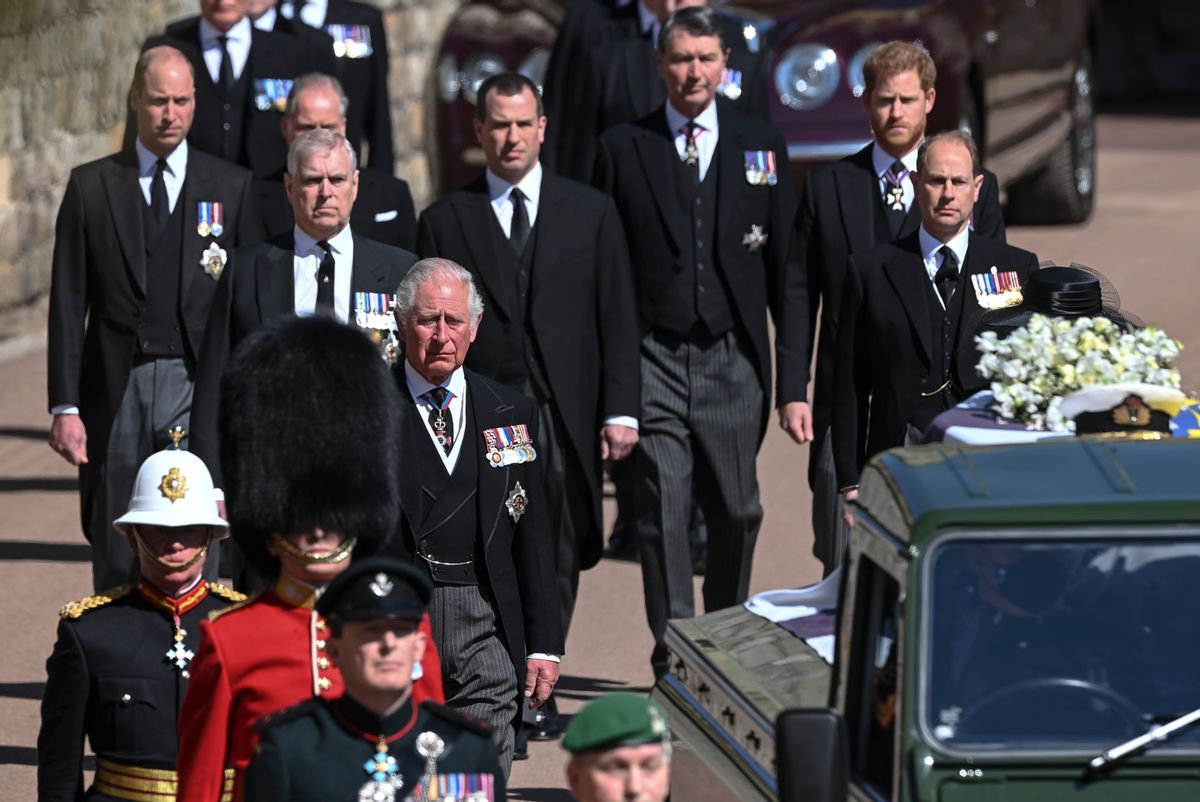 From front left, Britain's Prince Charles, Prince Andrew. Prince Edward, Prince William, Peter Phillips, Prince Harry, Earl of Snowdon and Tim Laurence follow the coffin the coffin makes it's way past the Round Tower during the funeral of Britain's Prince Philip inside Windsor Castle in Windsor, England Saturday April 17, 2021. (Leon Neal/Pool via AP) (AP Photo/Leon Neal)