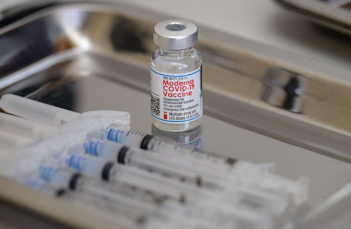 A vial of the Moderna Covid-19 vaccine and syringes sit prepared at a pop up vaccine clinic at the Jewish Community Center on April 16, 2021 in the Staten Island borough of New York City. (Photo by Angela Weiss / AFP) (Photo by ANGELA WEISS/AFP via Getty Images) (ANGELA WEISS/AFP via Getty Images)