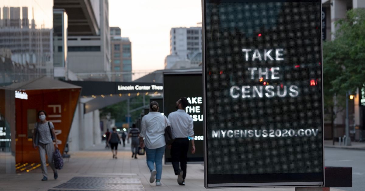 NEW YORK, NEW YORK - SEPTEMBER 09: People walk near "Take the Census" signs displayed on digital billboards at Lincoln Center for the Performing Arts as the city continues Phase 4 of re-opening following restrictions imposed to slow the spread of coronavirus on September 09, 2020 in New York City. The fourth phase allows outdoor arts and entertainment, sporting events without fans and media production. (Photo by Alexi Rosenfeld/Getty Images) (Alexi Rosenfeld / Getty Images)