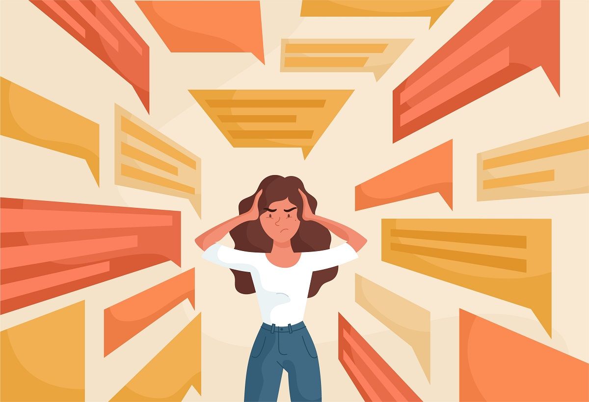 Sad young woman covering ears with hands to stop flow of negative information. Fake news, advertising noise, disinformation, raising a panic concept. Flat cartoon vector illustration (Rudzhan Nagiev/iStock/Getty Images Plus)