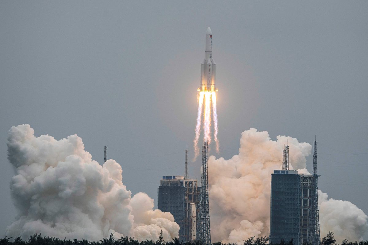 A Long March 5B rocket, carrying China's Tianhe space station core module, lifts off from the Wenchang Space Launch Center in southern China's Hainan province on April 29, 2021. - China OUT (Photo by STR / AFP) / China OUT (Photo by STR/AFP via Getty Images) (Getty Images)