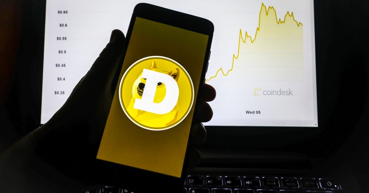 Dogecoin logo is displayed on a mobile phone screen photographed for illustration photo. Gliwice, Poland on May 6, 2021. Dogecoin, the meme cryptocurrency styled after an internet-famous Shiba Inu that was launched as a joke in 2013, is now worth more than the Ford motor company, BP or Tesco. (Photo by Beata Zawrzel/NurPhoto via Getty Images) (Beata Zawrzel/NurPhoto via Getty Images)