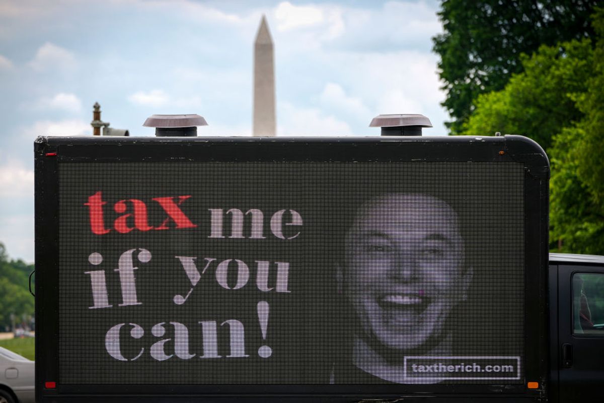 WASHINGTON, DC - MAY 17: A mobile billboard calling for higher taxes on the ultra-wealthy depicts an image of billionaire businessman Elon Musk, near the U.S. Capitol on May 17, 2021 in Washington, DC. Organized by the group "Patriotic Millionaires," the mobile billboards are rolling through Washington, DC and New York City on Monday to mark Tax Day, calling for higher taxes for wealthy Americans. (Photo by Drew Angerer/Getty Images) (Drew Angerer / Getty Images)