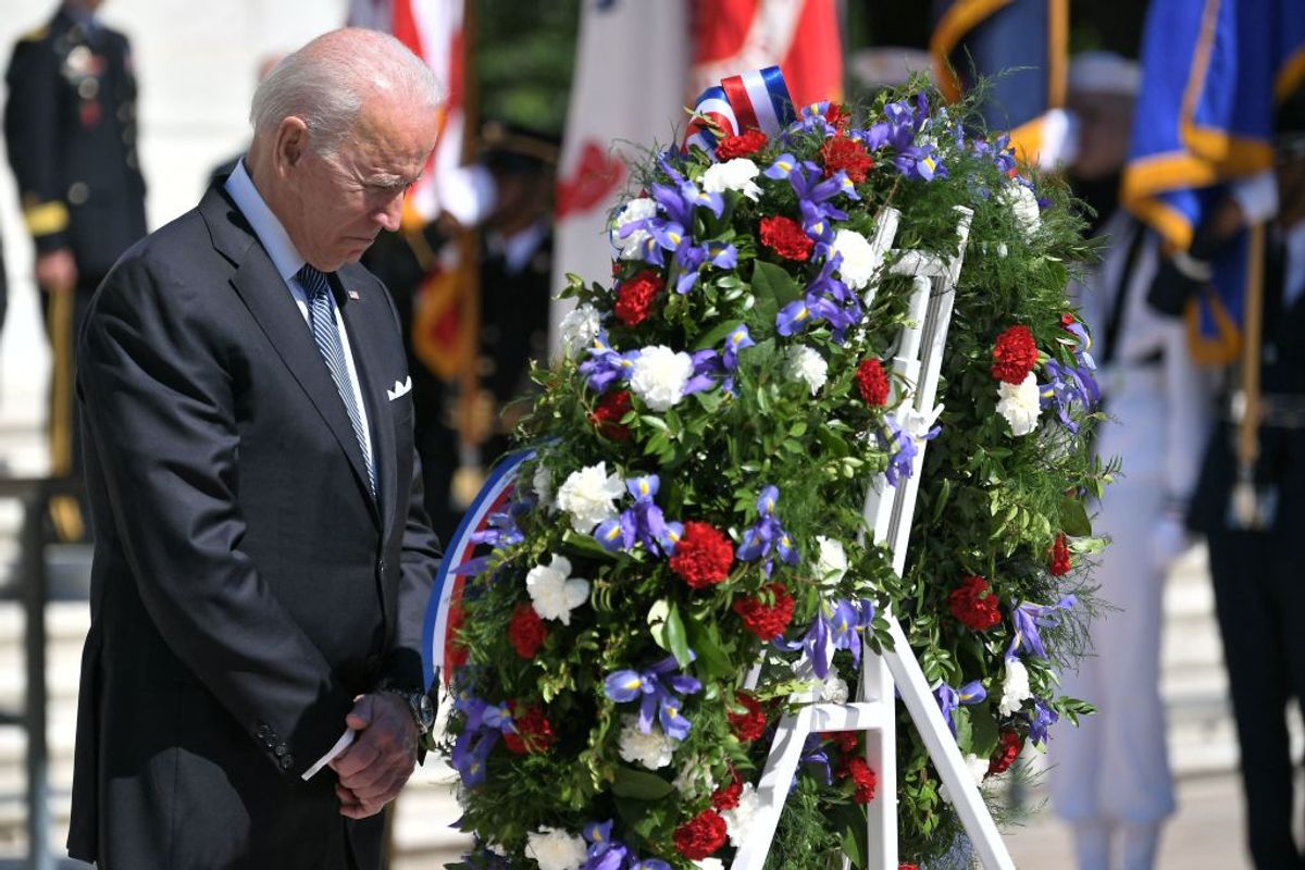 US President Joe Biden takes part in a wreath laying in front of Tomb of the Unknown Soldier at Arlington National Cemetery on Memorial Day in Arlington, Virginia on May 31, 2021. (Photo by MANDEL NGAN / AFP) (Photo by MANDEL NGAN/AFP via Getty Images) (MANDEL NGAN/AFP via Getty Image)