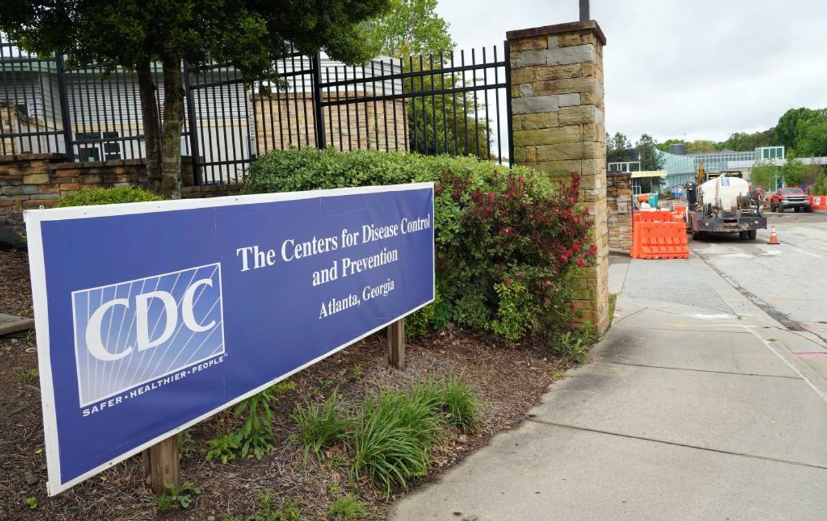 A sign is seen by the entrance of the Centers for Disease Control and Prevention in Atlanta, Georgia on April 23, 2020. - The worldwide death toll from the novel coronavirus pandemic rose to 186,462 on April 23, according to a tally from official sources compiled by AFP at 1900 GMT. (Photo by Tami Chappell / AFP) (Photo by TAMI CHAPPELL/AFP via Getty Images) (Tami Chappell/AFP via Getty Images)