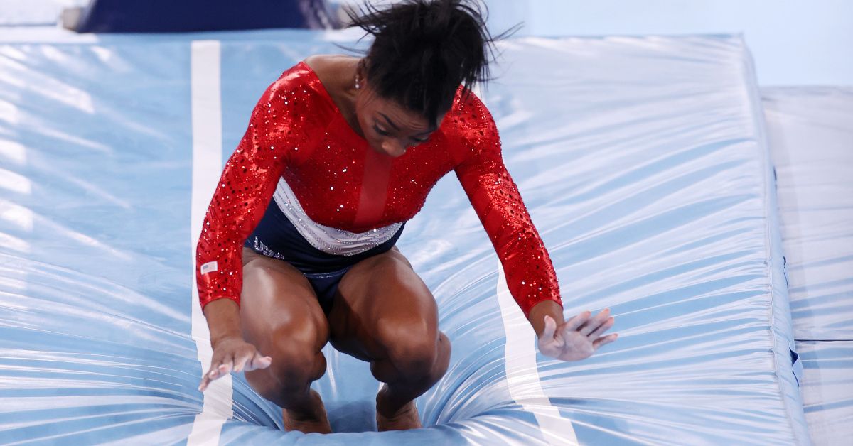 TOKYO, JAPAN - JULY 27: Simone Biles of Team United States stumbles upon landing after competing in vault during the Women's Team Final on day four of the Tokyo 2020 Olympic Games at Ariake Gymnastics Centre on July 27, 2021 in Tokyo, Japan. (Photo by Jamie Squire/Getty Images) (Jamie Squire/Getty Images)