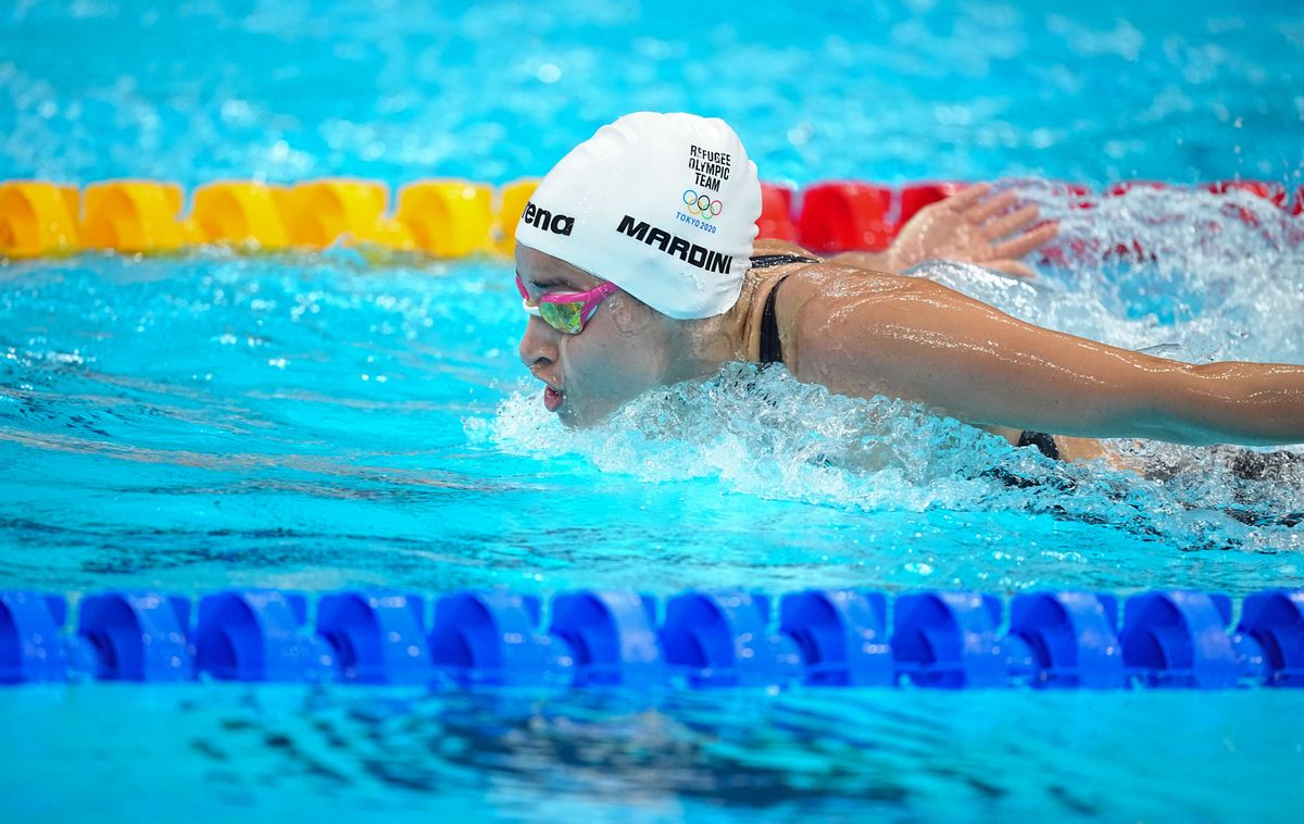 24 July 2021, Japan, Tokio: Swimming: Olympics, heats: 100m butterfly, women at Tokyo Aquatics Centre. Yusra Mardini of IOC Refugee Olympic Team in action. Photo: Michael Kappeler/dpa (Photo by Michael Kappeler/picture alliance via Getty Images) (Getty Images)