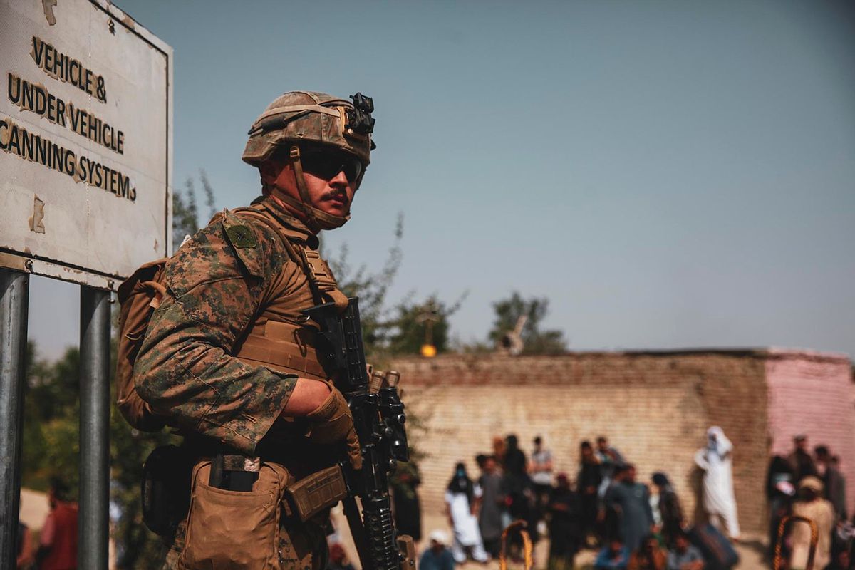 210818-M-TU241-1015 HAMID KARZAI INTERNATIONAL AIRPORT, Afghanistan (August 18, 2021) A Marine with the 24th Marine Expeditionary Unit (MEU) provides security during an evacuation at Hamid Karzai International Airport, Kabul, Afghanistan, Aug. 18. U.S. Marines are assisting the Department of State with an orderly drawdown of designated personnel in Afghanistan. (U.S. Marine Corps photo by Sgt. Isaiah Campbell) (U.S. Central Command Public Affairs/Wikimedia Commons)