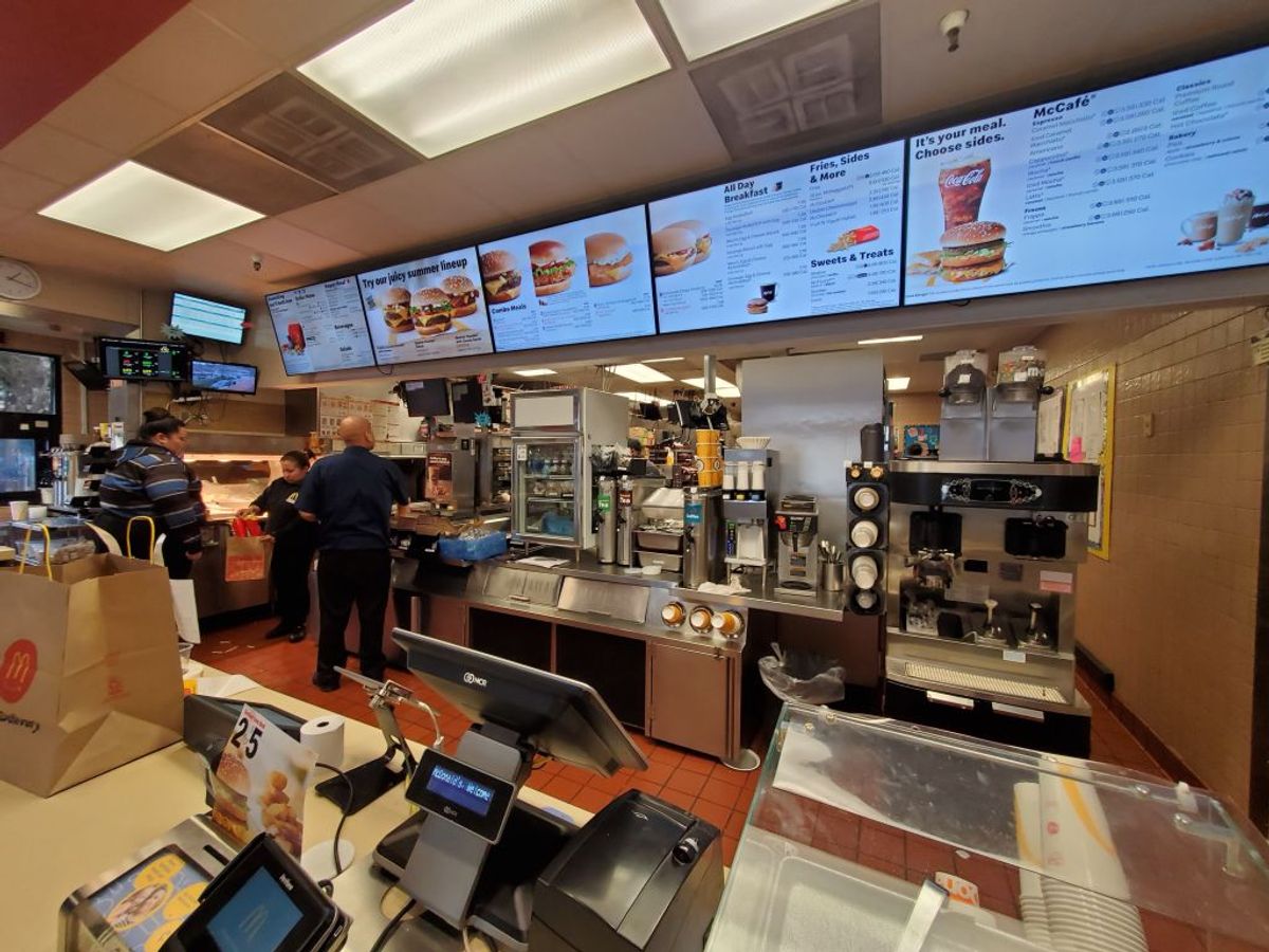 Counter area, kitchen and menus are visible in wide angle view in interior of McDonald's restaurant in San Ramon, California, January 21, 2020. (Photo by Smith Collection/Gado/Getty Images) (Getty Images)