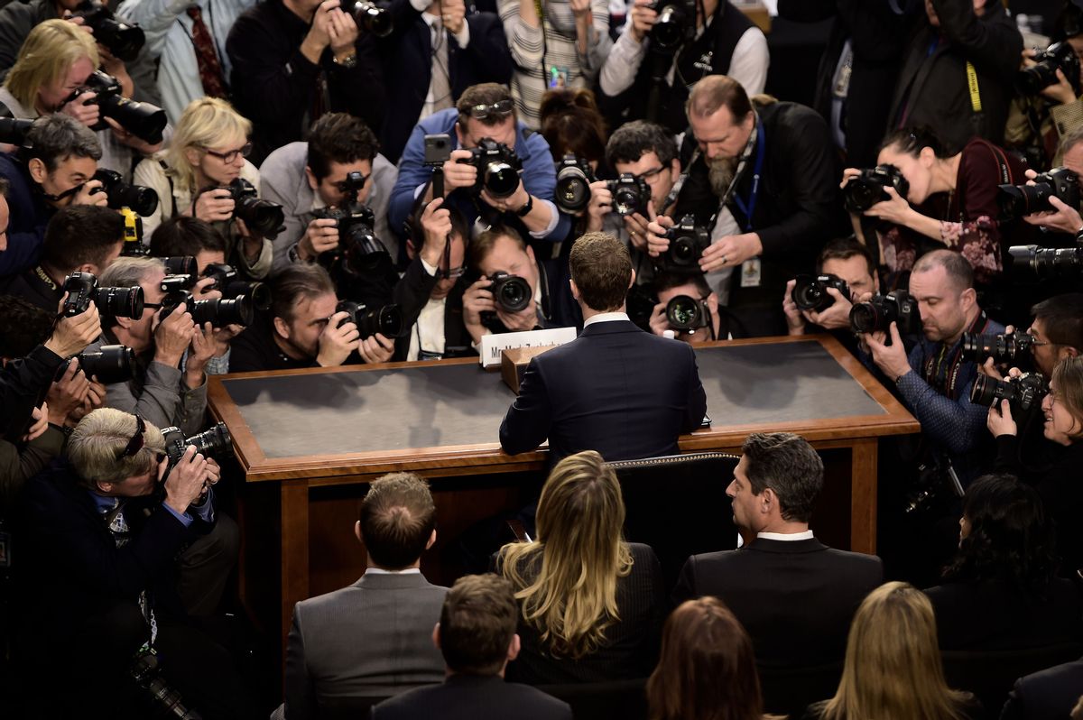 Facebook CEO Mark Zuckerberg(C) waits for a joint hearing of the Senate Commerce, Science and Transportation Committee and Senate Judiciary Committee on Capitol Hill April 10, 2018 in Washington, DC.
Zuckerberg, making his first formal appearance at a Congressional hearing, seeks to allay widespread fears ignited by the leaking of private data on tens of millions of users to British firm Cambridge Analytica working on Donald Trump's 2016 presidential campaign. / AFP PHOTO / Brendan Smialowski        (Photo credit should read BRENDAN SMIALOWSKI/AFP via Getty Images) (BRENDAN SMIALOWSKI/AFP via Getty Images)